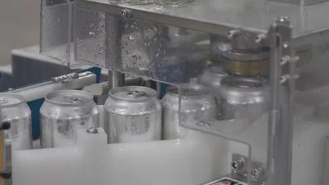 Cans Being Topped Stock Footage 244720800