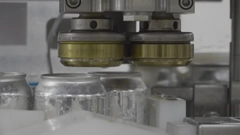 Cans Being Topped Stock Footage 244723293