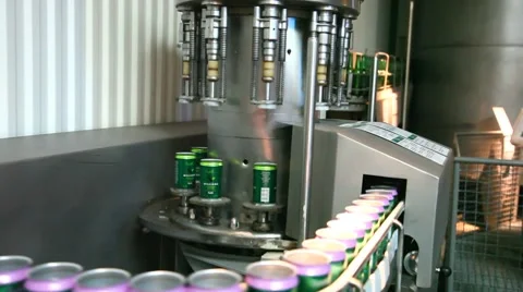 Cans in a filling machine Video stock 8689190