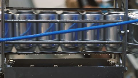 The cans motion on a production line Video stock 162526838