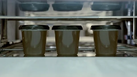 Cans of soup in a factory Stock Footage 78030756
