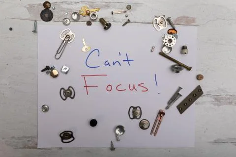 Can't focus sign framed by random scattered junk Stock Photos