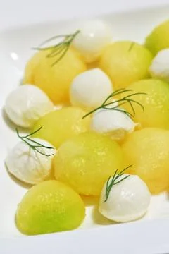 Cantaloupe melon with mozzarella Stock Photos