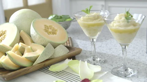 Cantaloupe recipes on kitchen worktop dolly back Stock Footage 63779713