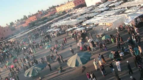 Canted angle of Jemma el-Fnaa market, Marrakech, Morocco Stock Footage 11413086