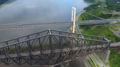 Cantilevered bridge pillars, the historic Quebec Bridge and the Pierre-Laporte. Stock Footage 320245670