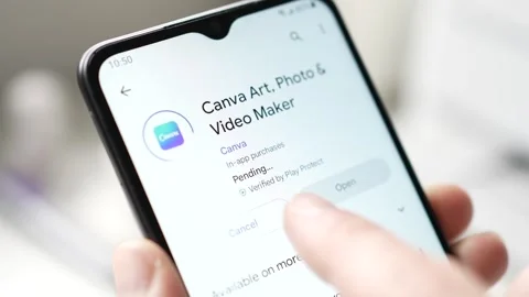 Canva Editing App Downloading on a Smartphone Screen Stock Footage 247521613