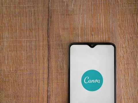 Canva - Graphic Design app launch screen with logo on the display of a black  Stock Photos