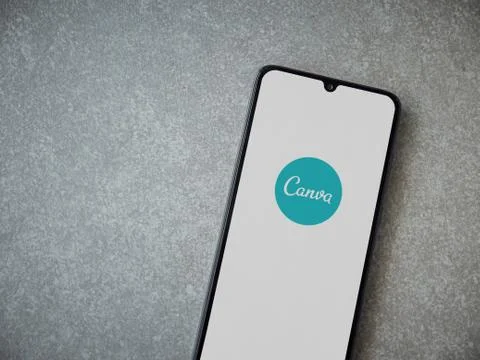 Canva - Graphic Design app launch screen with logo on the display of a black  Stock Photos