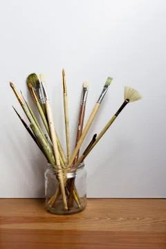 Canvas and brushes Stock Photos