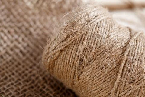 The canvas and the tangle of thread on a wooden background Stock Photos