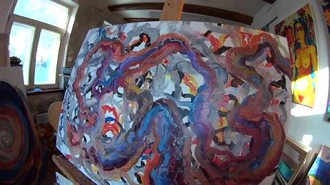 Canvas in the studio on an easel Stock Footage 166469254