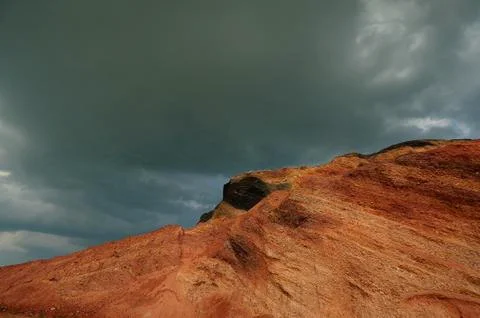 A canyon with a mountain in the background Stock Photos