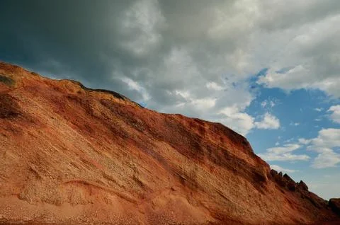 A canyon with a mountain in the background Stock Photos