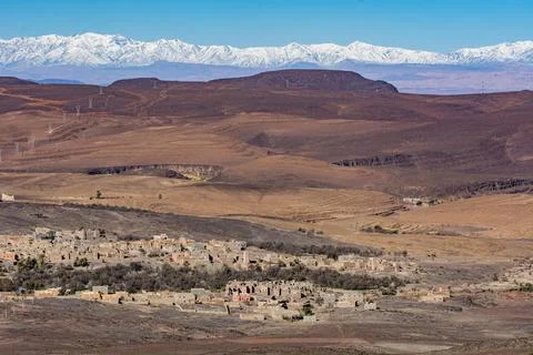 A canyon with a mountain in the background Stock Photos