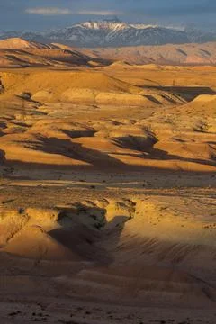 A canyon with a mountain in the background Stock Photos