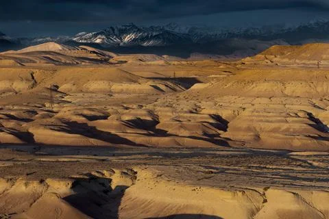 A canyon with a mountain in the background Stock Photos