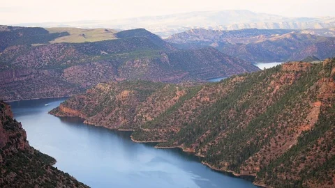 Canyon Rim high angle view in Flaming Gorge Utah green river boat Stock Footage 120604041