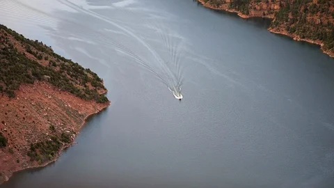 Canyon Rim high angle view in Flaming Gorge Utah green river boat wakeboard Stock Footage 120604629