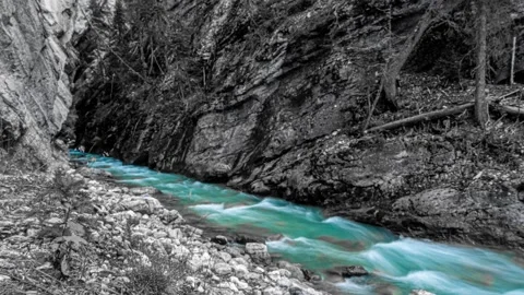 Canyon River Gorge Blur Background Black, White and Blue River Time Lapse 4K Stock Footage 134221452