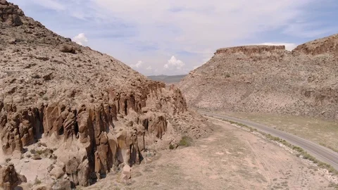 Canyon wall with road on the side Stock Footage 92698826