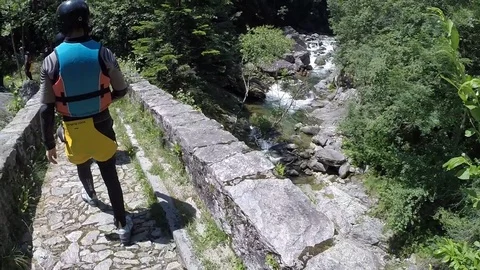 The canyoning first jump 動画素材 97447076