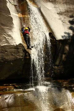Canyoning in Tessing, Man jumping in water Stock Photos