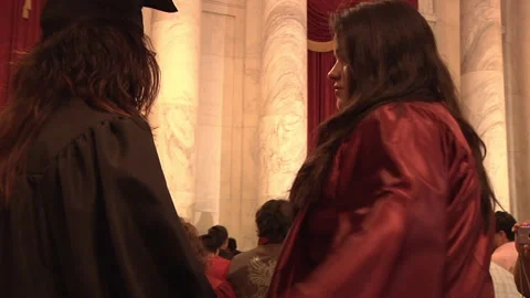 Cap and Gown hug Stock Footage 260842264