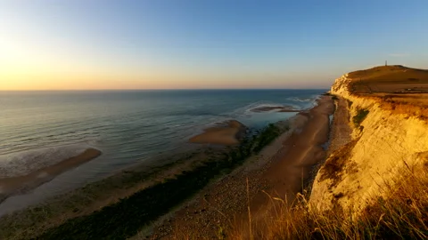 CAP BLANC NEZ, Couché de soleil sur les falaises de la Cote d'Opale, TIMELAPSE Vídeos de archivo 141756465