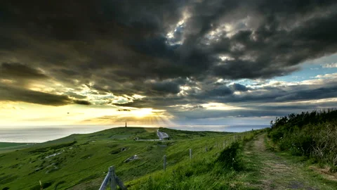 CAP BLANC NEZ, Couché de soleil sur les falaises de la Cote d'Opale, TIMELAPSE Vídeos de archivo 141760933
