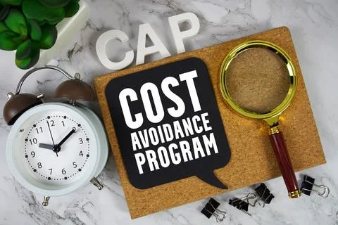 CAP Cost Avoidance Program text with alarm clock and magnifying glass on ma.. 写真素材