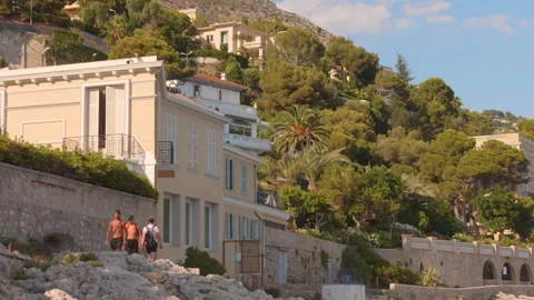 Cap d'Ail coastal path along the Mediterranean shoreline in the French Riviera Stock Footage 345417442