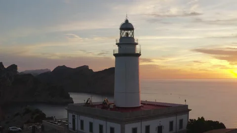 Cap de formentor - airial drone shot of the lighthouse at sunset Video stock 167624673