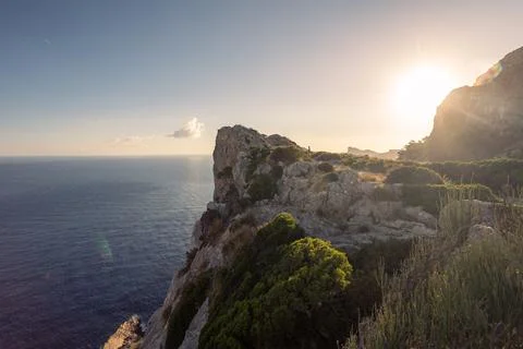 Cap de Formentor rocky cliffs and Mediterranean sea at sunset, northern tip of Stock Photos