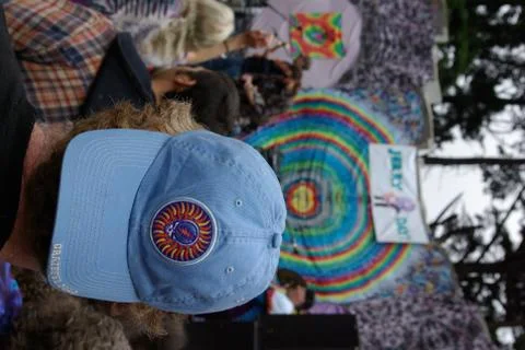Cap with grateful dead image in front of  stage Stock Photos