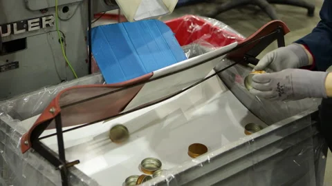 Cap lining Machine Producing Bottle Caps During Manufacturing Process Stock Footage 276356956