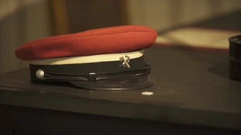 The cap is lying on a dark table, Video stock 150210302