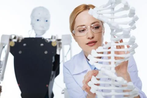 Capable qualified scientist studying the structure of human DNA Stock Photos