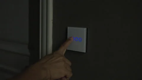 Capacitive touch switch to control room lighting on and off in luxury hotels. Video stock 245082940