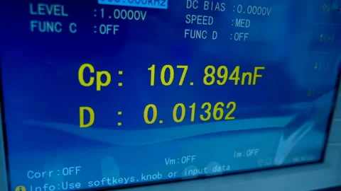 Capacitor capacitance measurement data with high accuracy on the screen Stock Footage 188091939