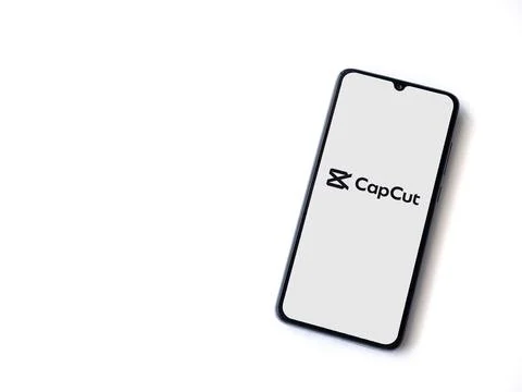 CapCut app launch screen on smartphone on white background. Stock Photos