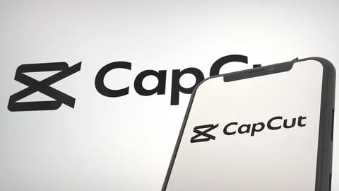 CapCut app logo in mobile display screen and background editorial Stock Photos