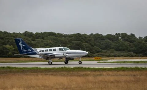 Cape Air plane landing at Martha's Vineyard Airport on a cloudy day Stock Photos