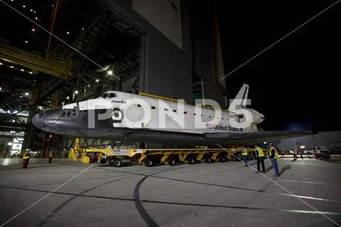 Photograph: CAPE CANAVERAL, Fla. Space shuttle Atlantis moves out of ...