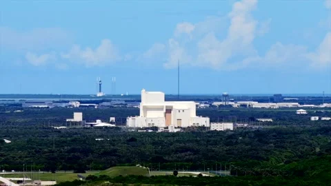 Cape Canaveral rocket launch and storage facilities. 1080p aerial parallax .. Video stock 316554865
