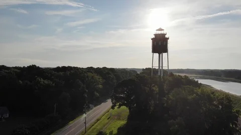 Cape Charles, Va lighthouse vertical aerial at sunrise Stock Footage 97837717