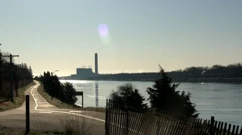 Cape cod canal, bike path &amp; power plant Stock Footage 10881385