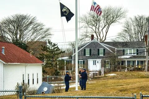 Cape Cod Coast Guard Raising Flags Stock Photos