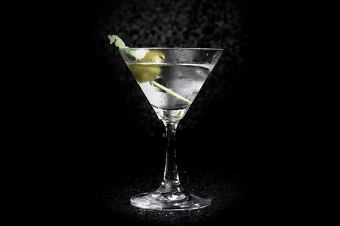 Cape Cod Cocktail on black background, selective focus, soft focus. Stock Photos