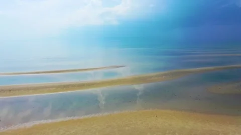 Cape Cod Drone Footage of Lightning Storm at Low Tide Coastline with Looming Stock Footage 316822391